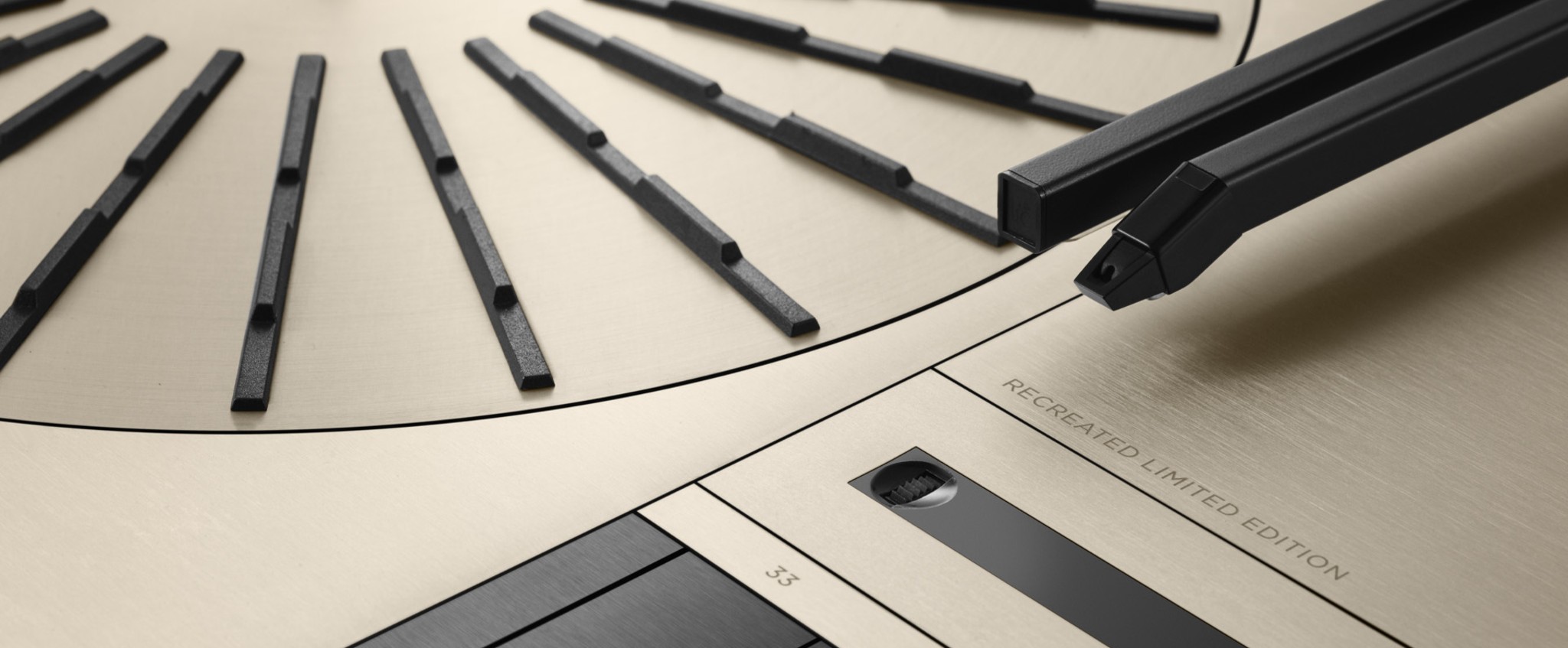 Close detail of the Bang & Olufsen Beogram 4000c in champagne aluminium, showing the platter and tangential arm
