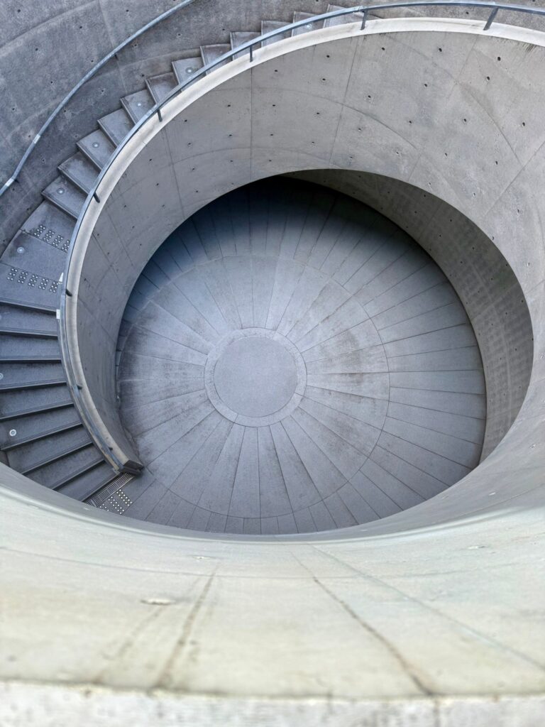 Looking down on Tadao Ando’s concrete spiral ramp at the Hyogo Prefectural Museum of Art, Kobe