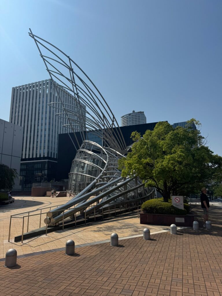 Cesar Pelli’s stainless steel and titanium frame above the National Museum of Art, Osaka